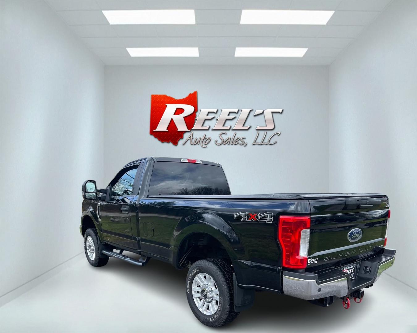 2017 Black /Gray Ford F-250 SD XLT Reg Cab 4WD (1FTBF2B69HE) with an 6.2L V8 OHV 16V FFV engine, 6-Speed Automatic transmission, located at 11115 Chardon Rd. , Chardon, OH, 44024, (440) 214-9705, 41.580246, -81.241943 - This 2017 Ford F-250 XLT Reg Cab is a capable heavy-duty truck equipped with a powerful 6.2L V8 engine, paired with a 6-speed automatic transmission and 3.73 gearing. It features daytime running lights, dusk-sensing headlights, a backup camera, backup sensors, and a snow plow package. This truck boa - Photo#11